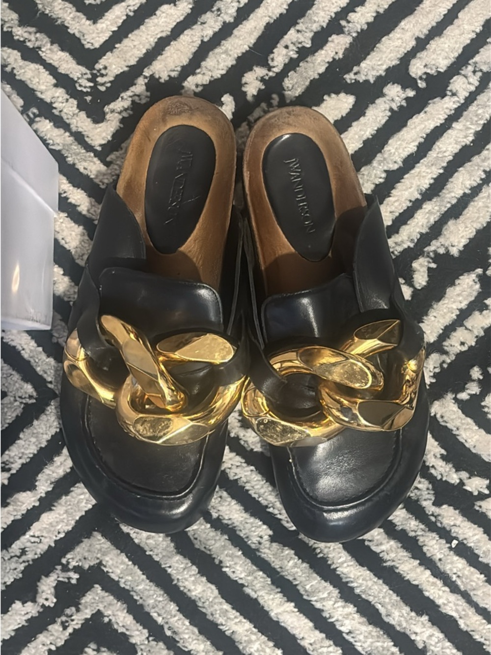 JW Anderson Black Leather Mules with Bold Gold Chain